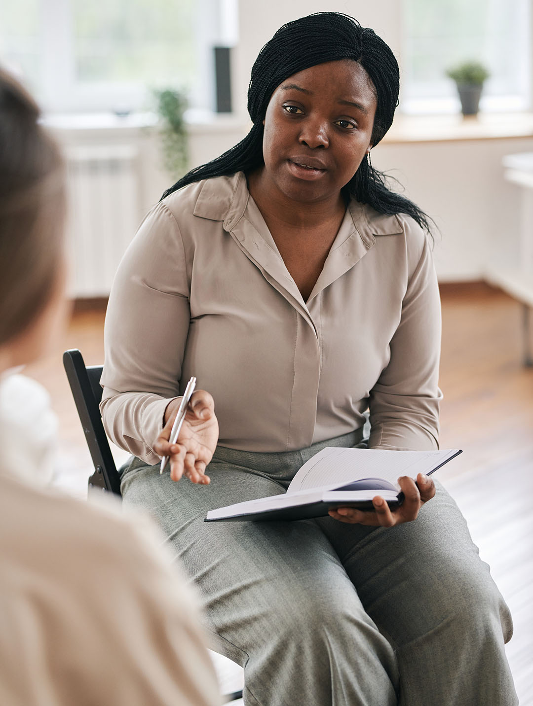 therapist and client in a calm conversation setting