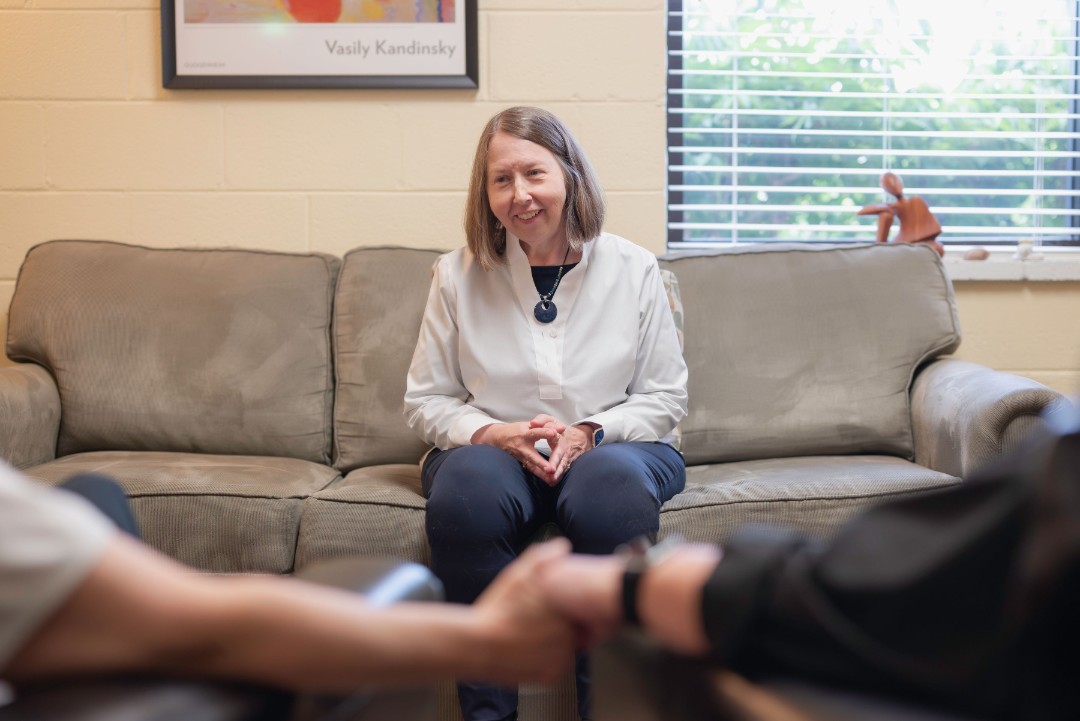 therapist and clients in a calm conversation setting